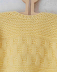 עליונית צהובה סרוגה בעבודת יד | 3-6 חודשים