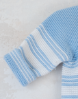 Knitted overalls in light blue and white | 6-9 months
