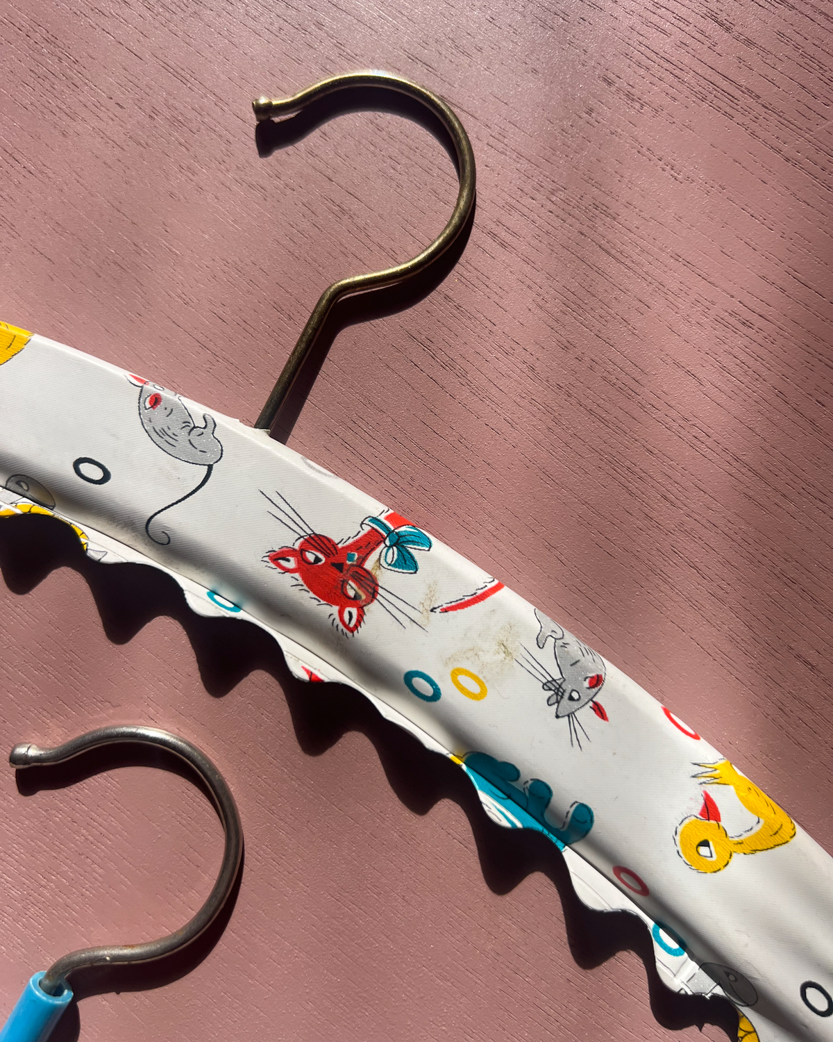 A pair of children's hangers from the 1970s 