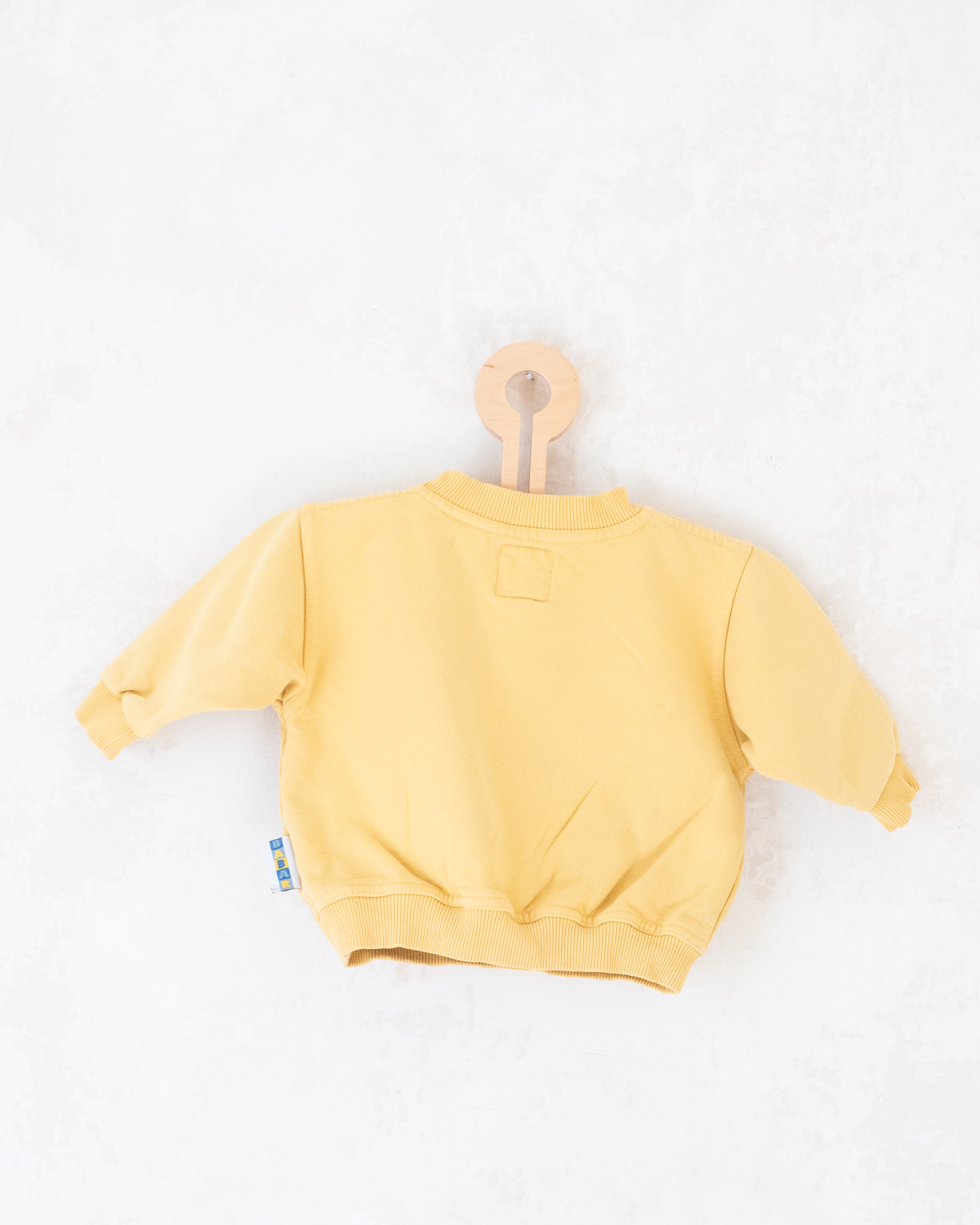 Yellow sweatshirt with embroidery of a bear sailing in a boat | 9-12 months