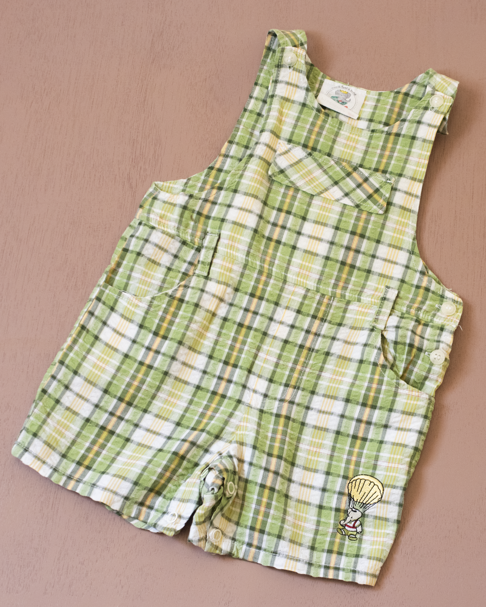 Green checkered overall with a Babar the Elephant embroidery in a parachute | 18-24 months
