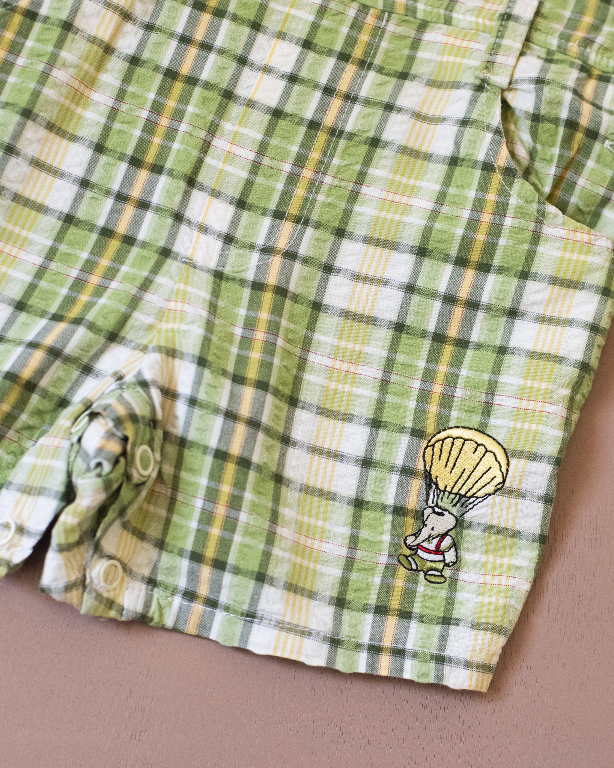 Green checkered overall with a Babar the Elephant embroidery in a parachute | 18-24 months