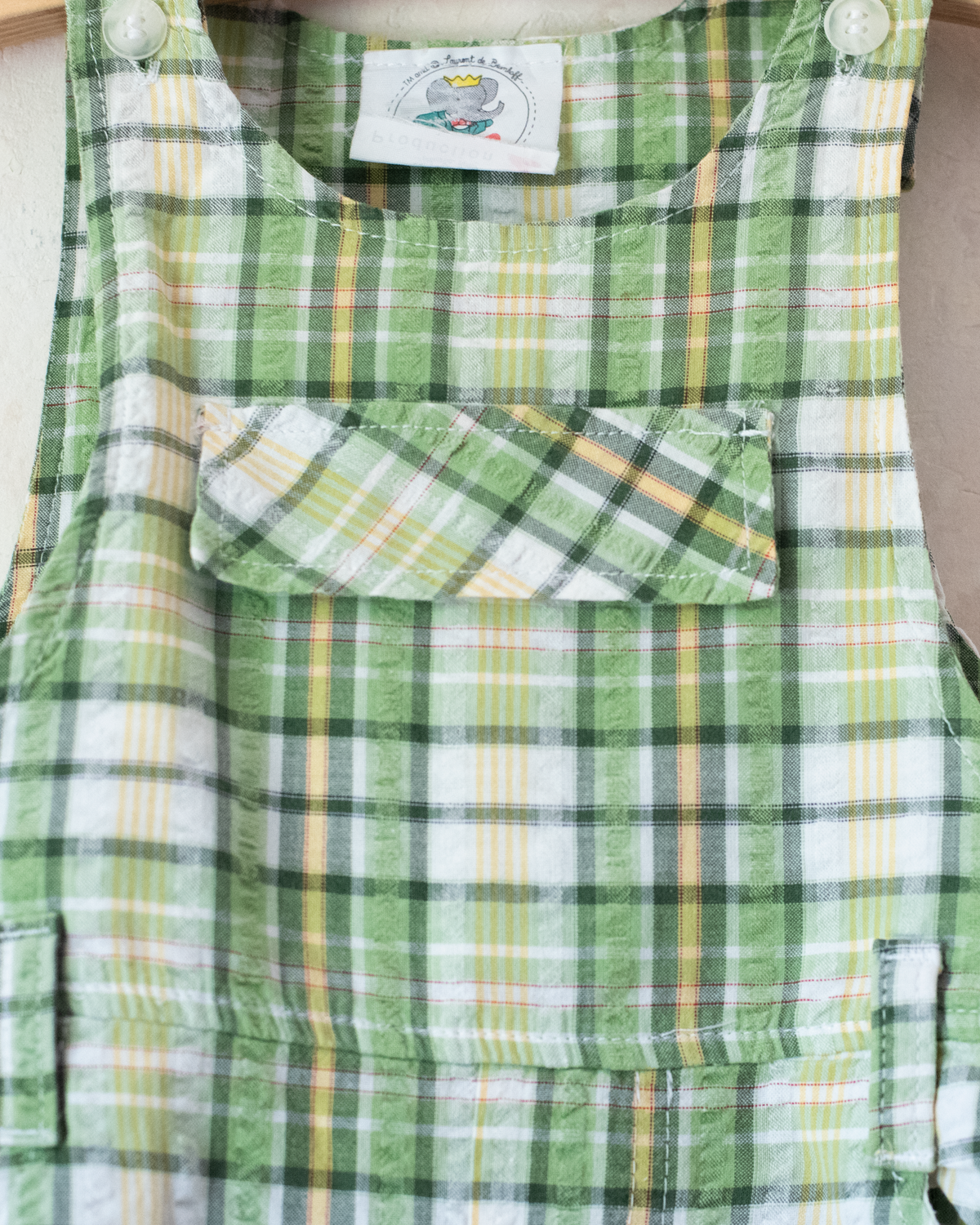 Green checkered overall with a Babar the Elephant embroidery in a parachute | 18-24 months