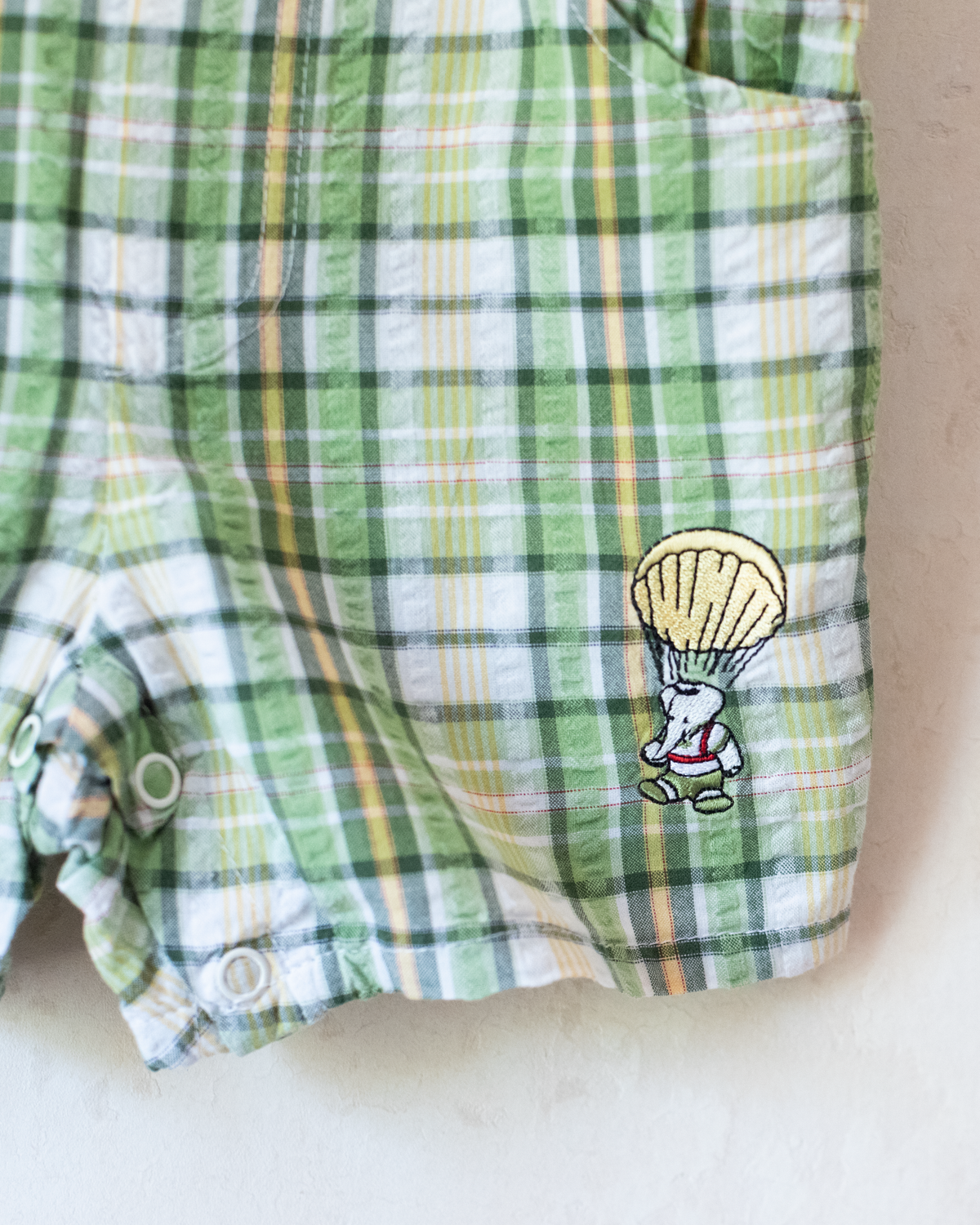 Green checkered overall with a Babar the Elephant embroidery in a parachute | 18-24 months