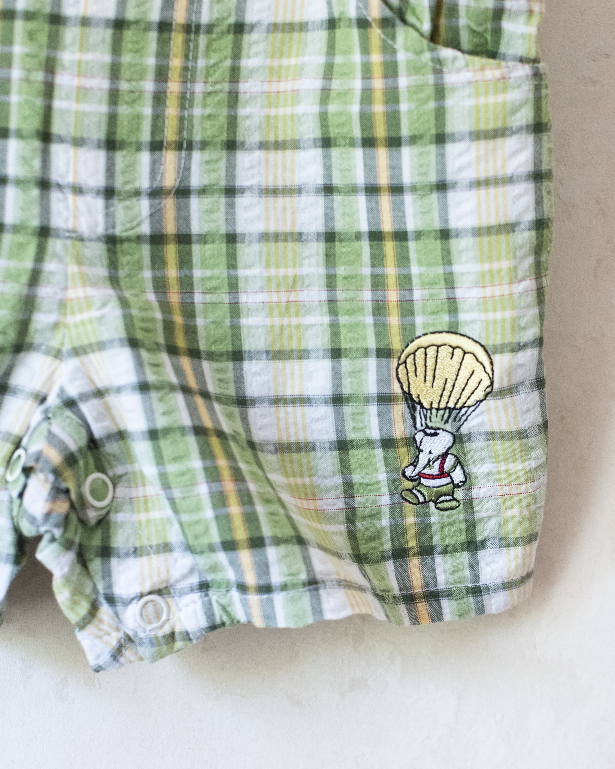 Green checkered overall with a Babar the Elephant embroidery in a parachute | 18-24 months