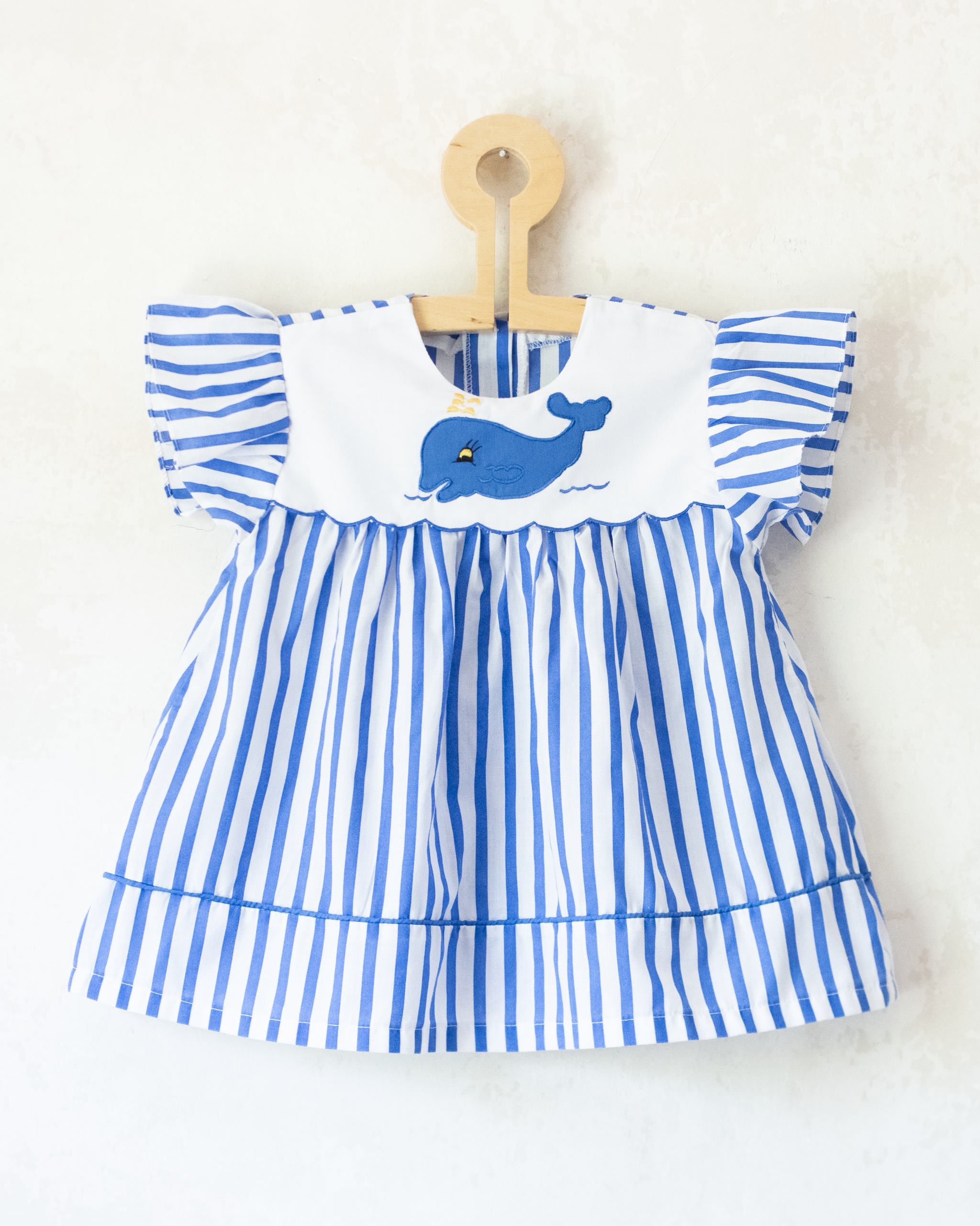 Striped dress with embroidered whale | 12-18 months