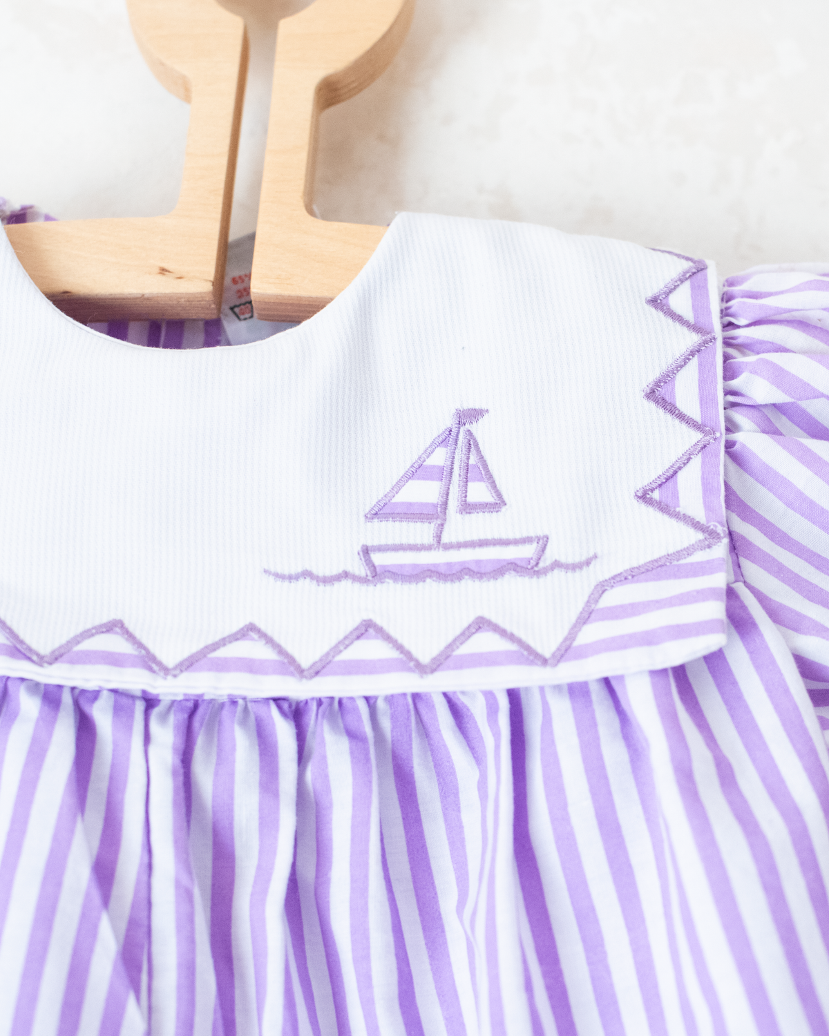 Sailor jumpsuit with stripes and embroidered collar | 18-24 months
