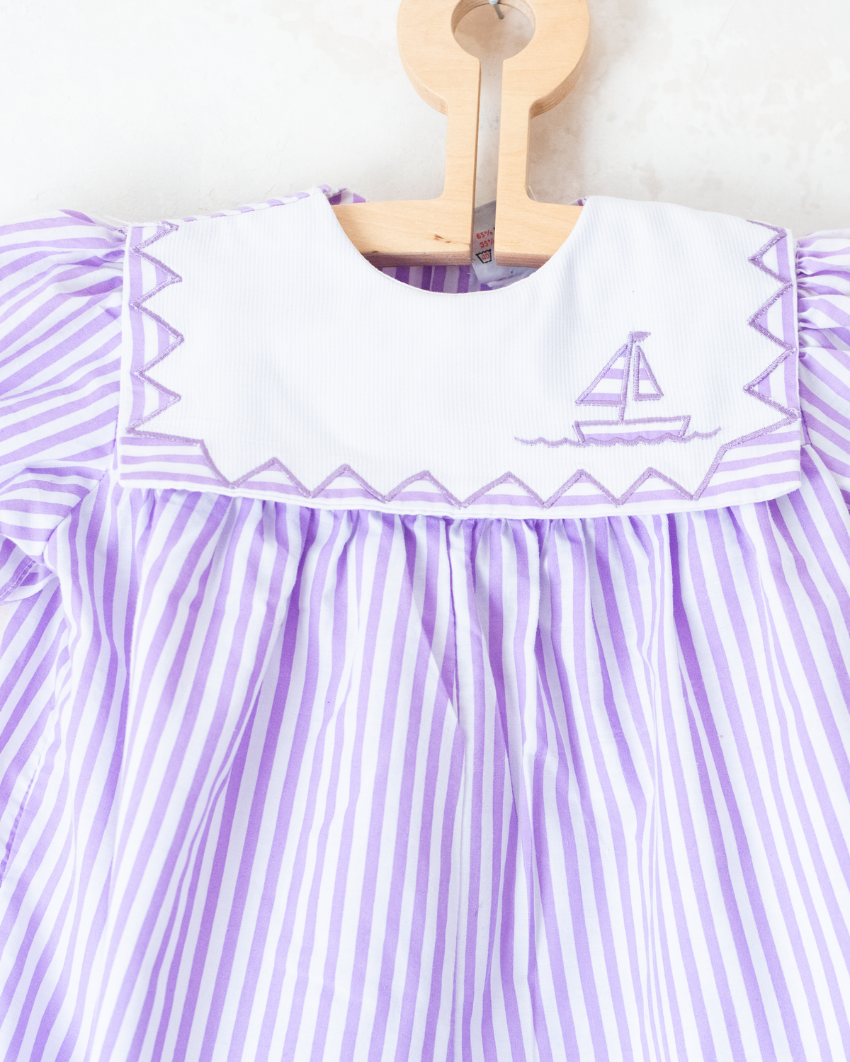 Sailor jumpsuit with stripes and embroidered collar | 18-24 months