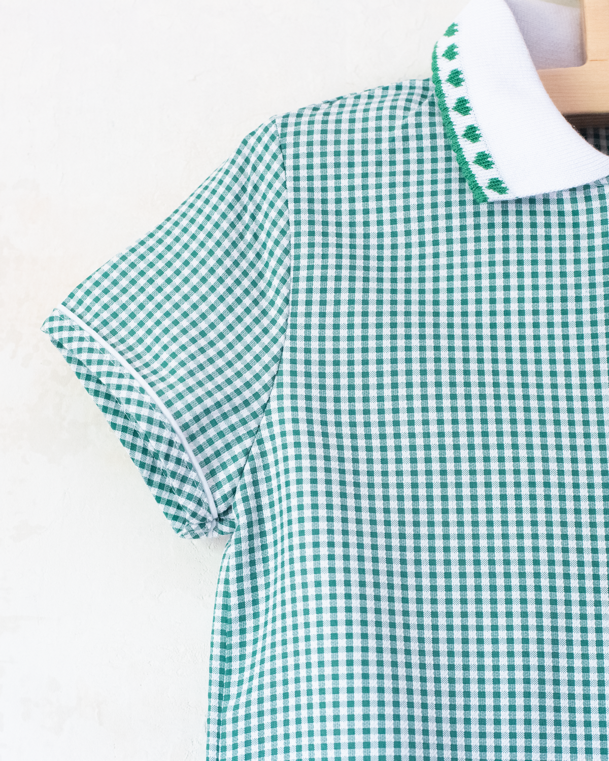 Green and white plaid dress with hearts at the collar | 4-5 years