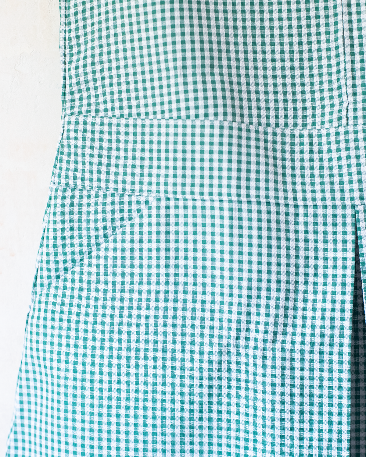 Green and white plaid dress with hearts at the collar | 4-5 years