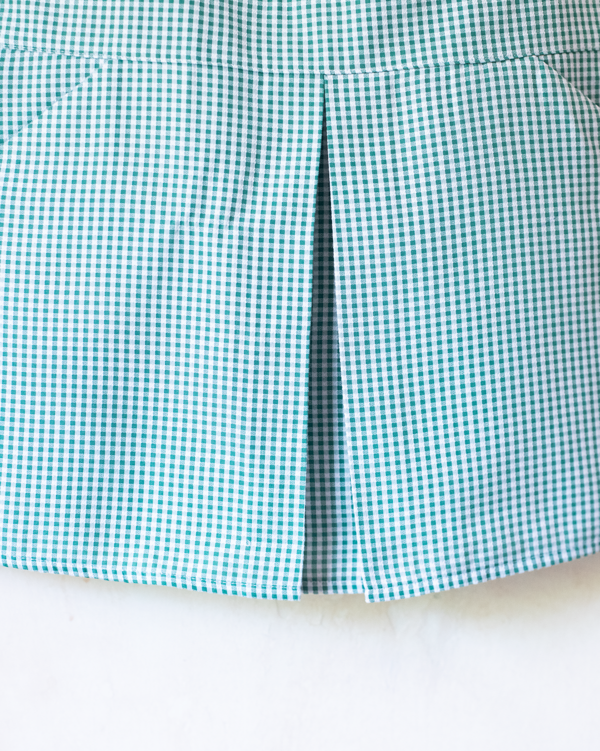 Green and white plaid dress with hearts at the collar | 4-5 years