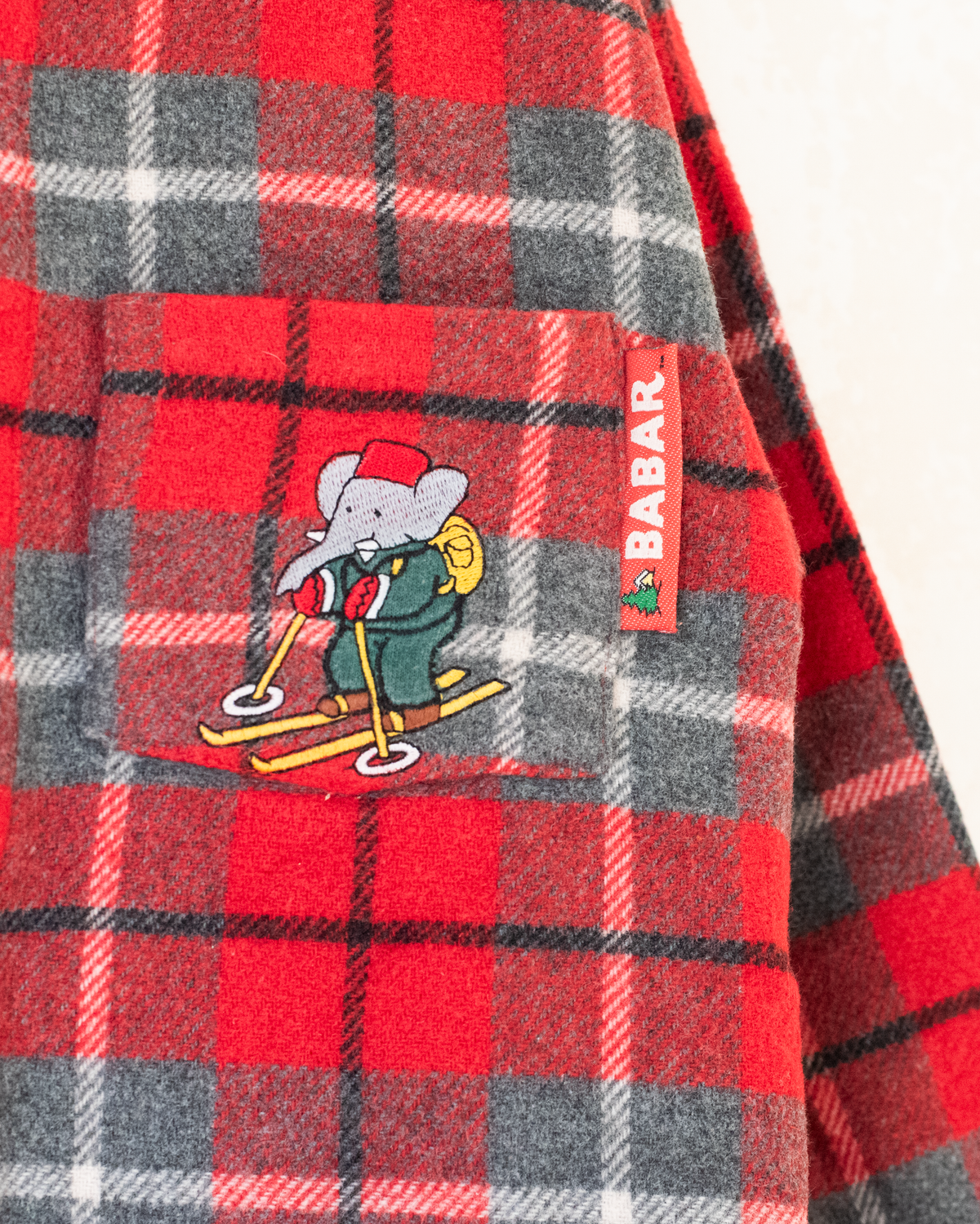Plaid fleece shirt with the king in the ski bar | 4-5 years