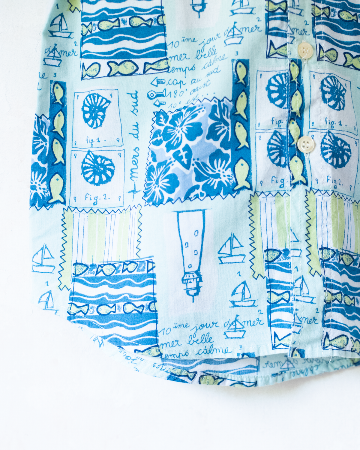 Short button-down shirt in shades of blue with summer prints | 9-10 years