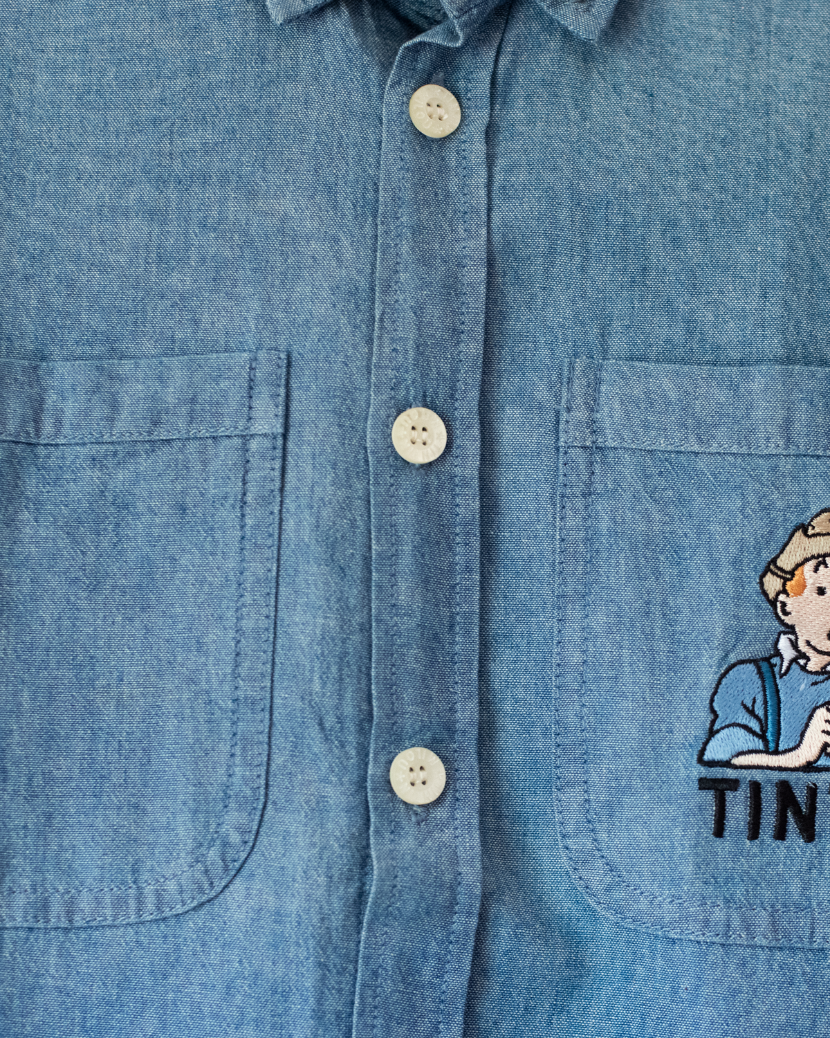 Tintin embroidered button-up denim shirt | Dead stock | 6-7 years