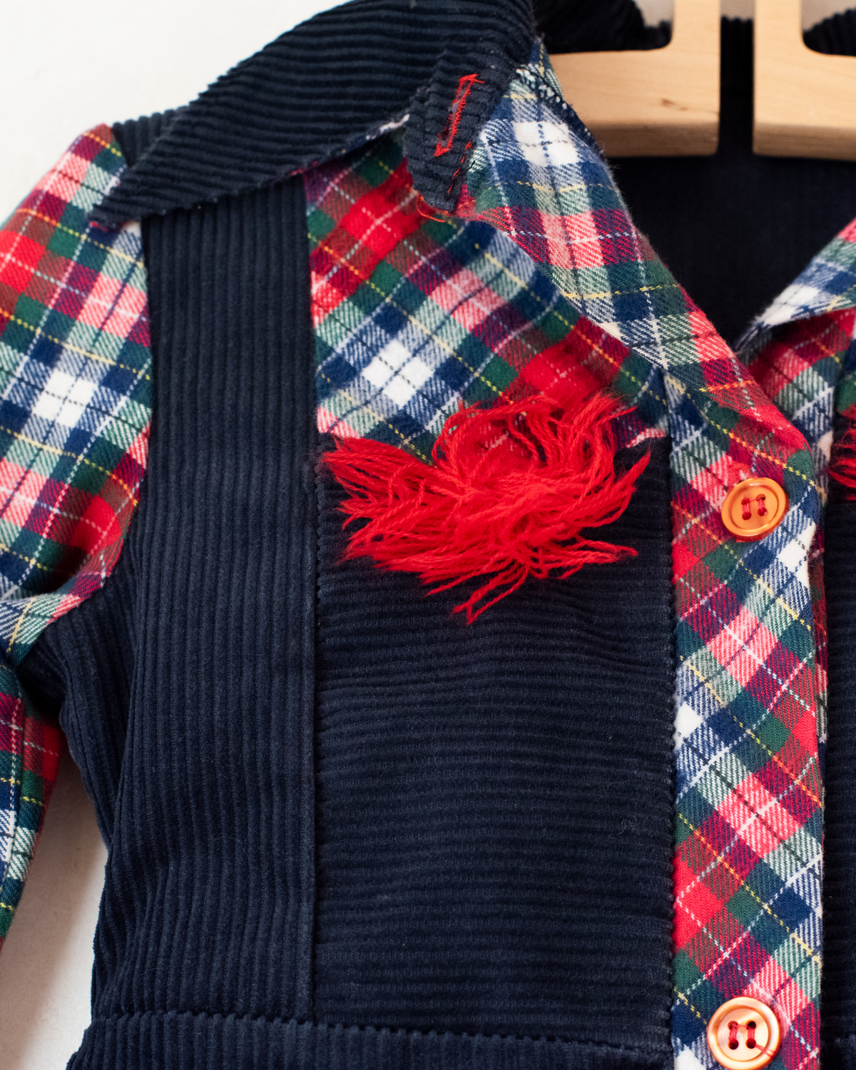 Corduroy dress with checks and pompoms | 3-4 years