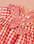 Red plaid romper with bow | 9-12 months