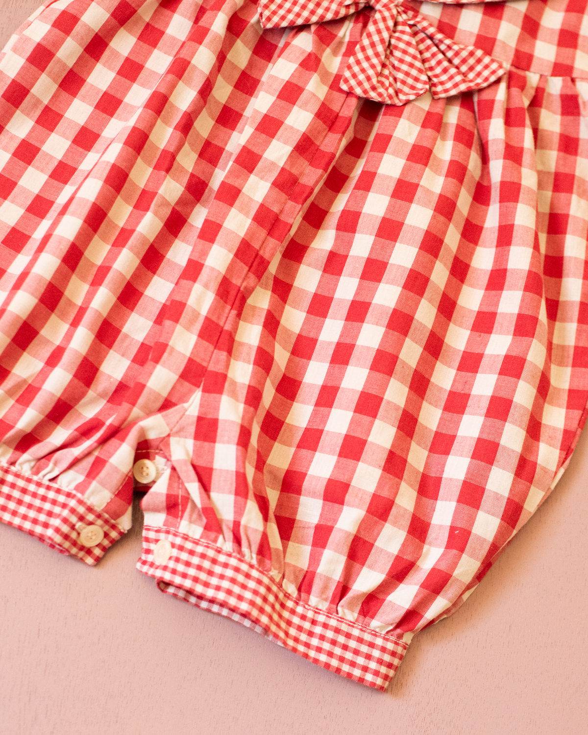 Red plaid romper with bow | 9-12 months