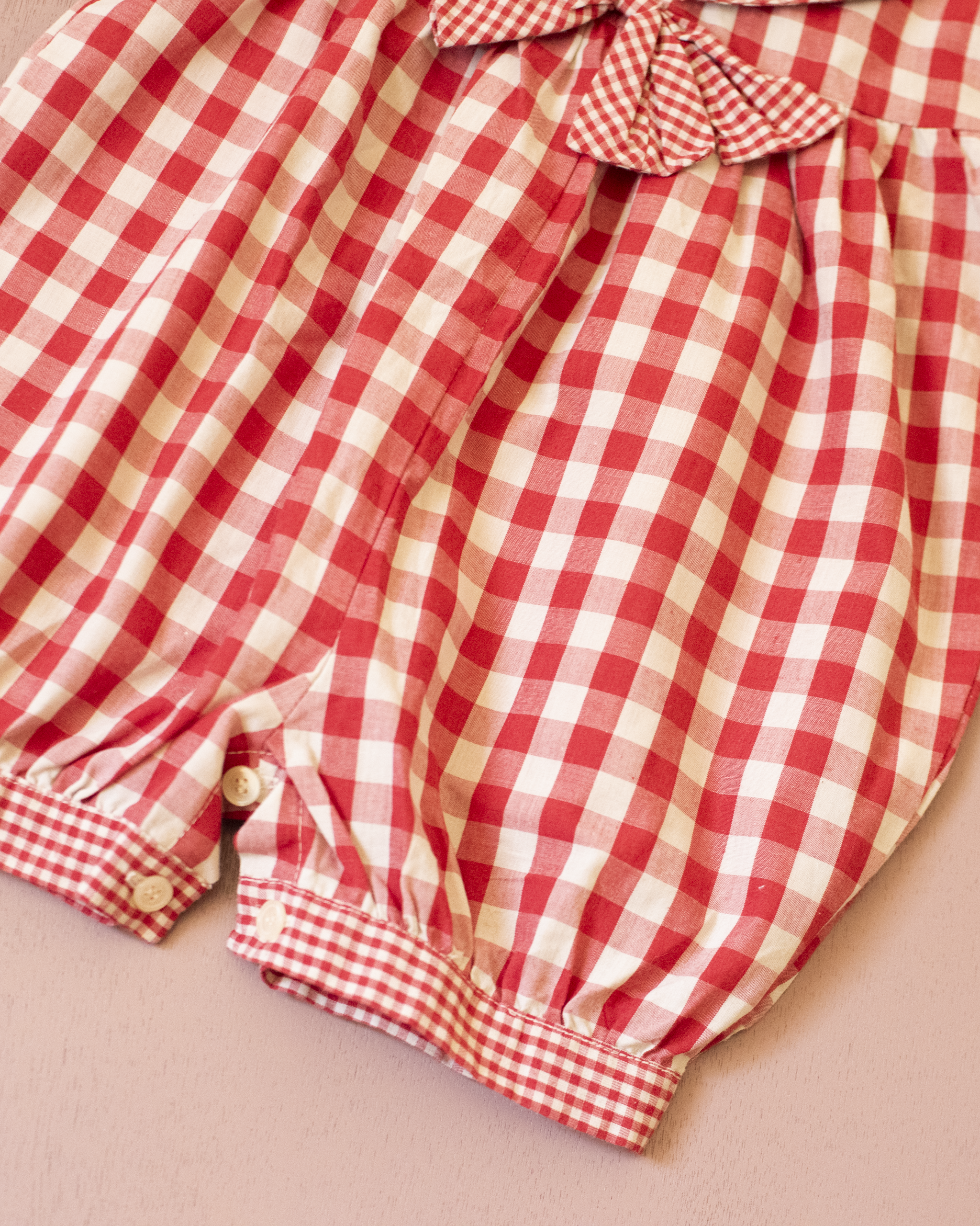 Red plaid romper with bow | 9-12 months