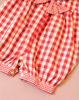 Red plaid romper with bow | 9-12 months