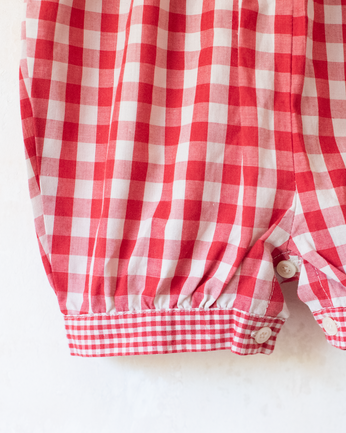 Red plaid romper with bow | 9-12 months