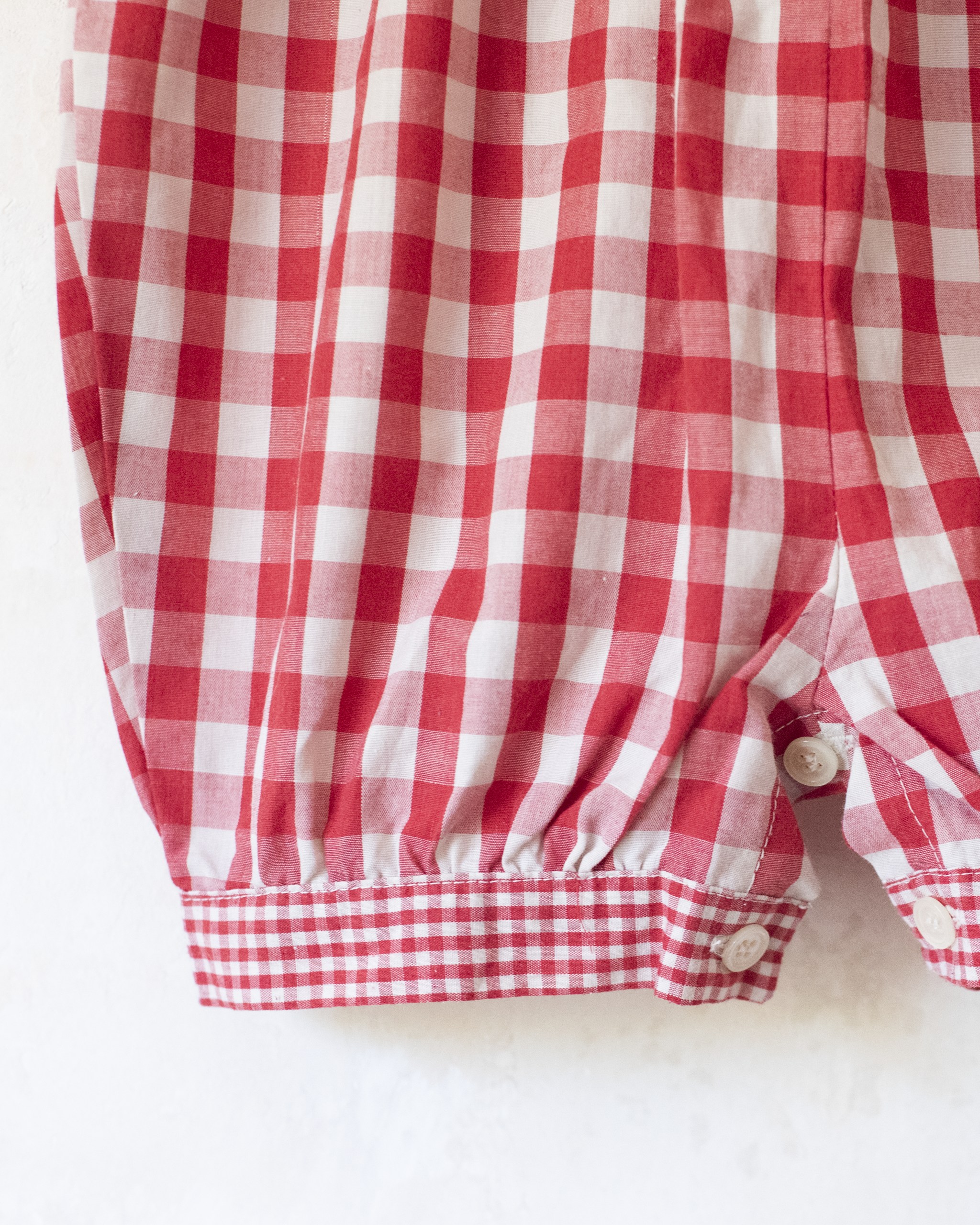 Red plaid romper with bow | 9-12 months