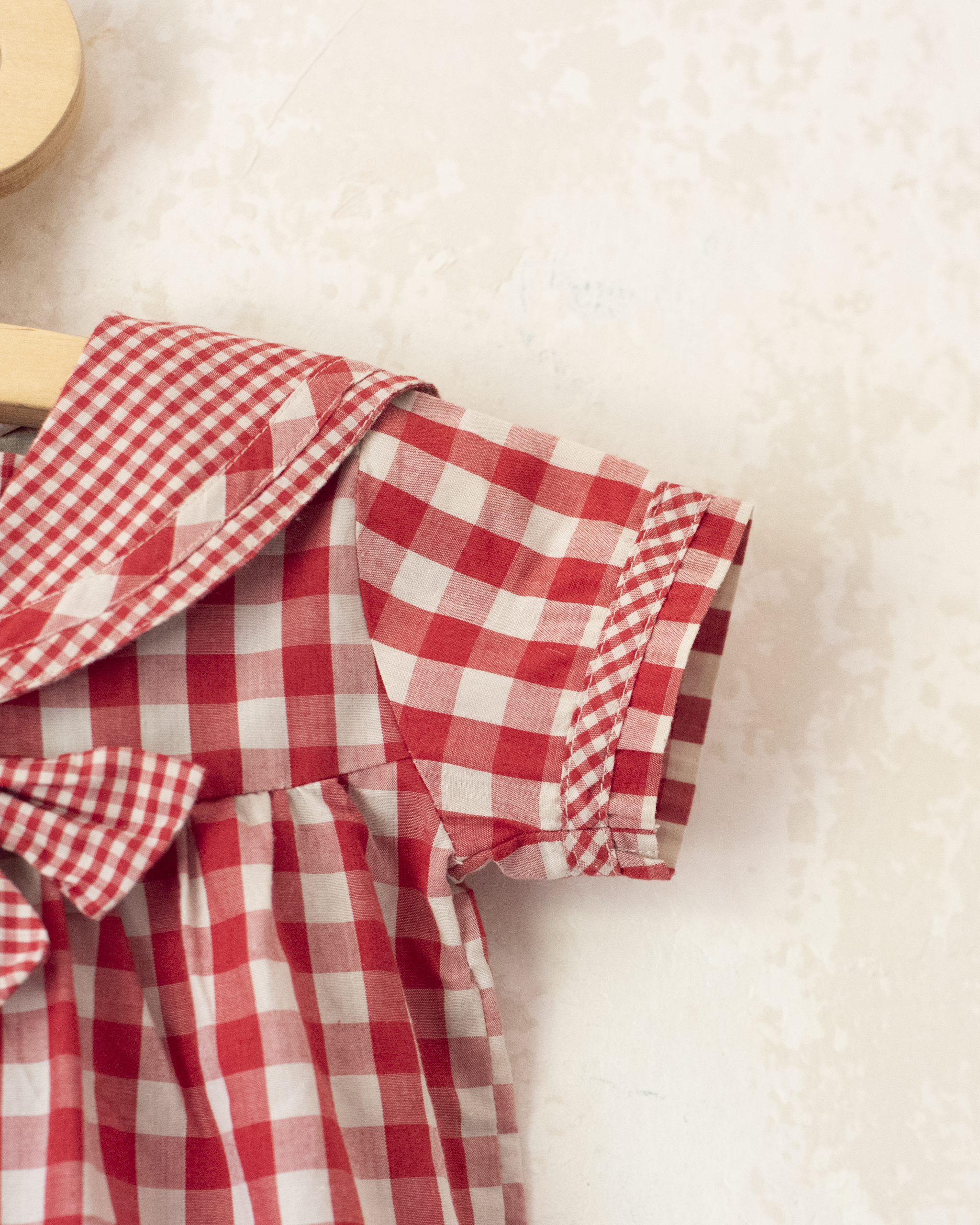Red plaid romper with bow | 9-12 months