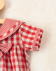 Red plaid romper with bow | 9-12 months