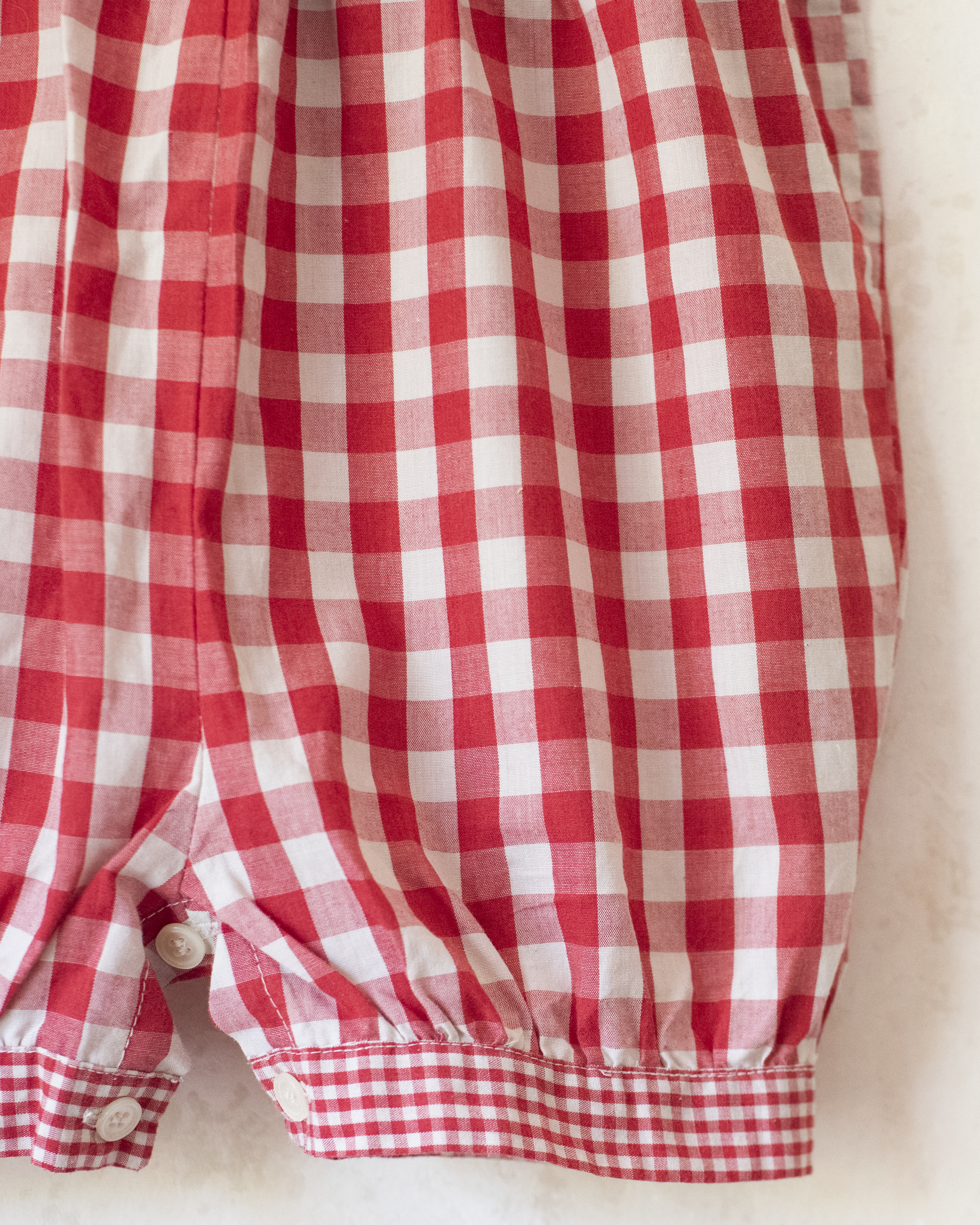 Red plaid romper with bow | 9-12 months