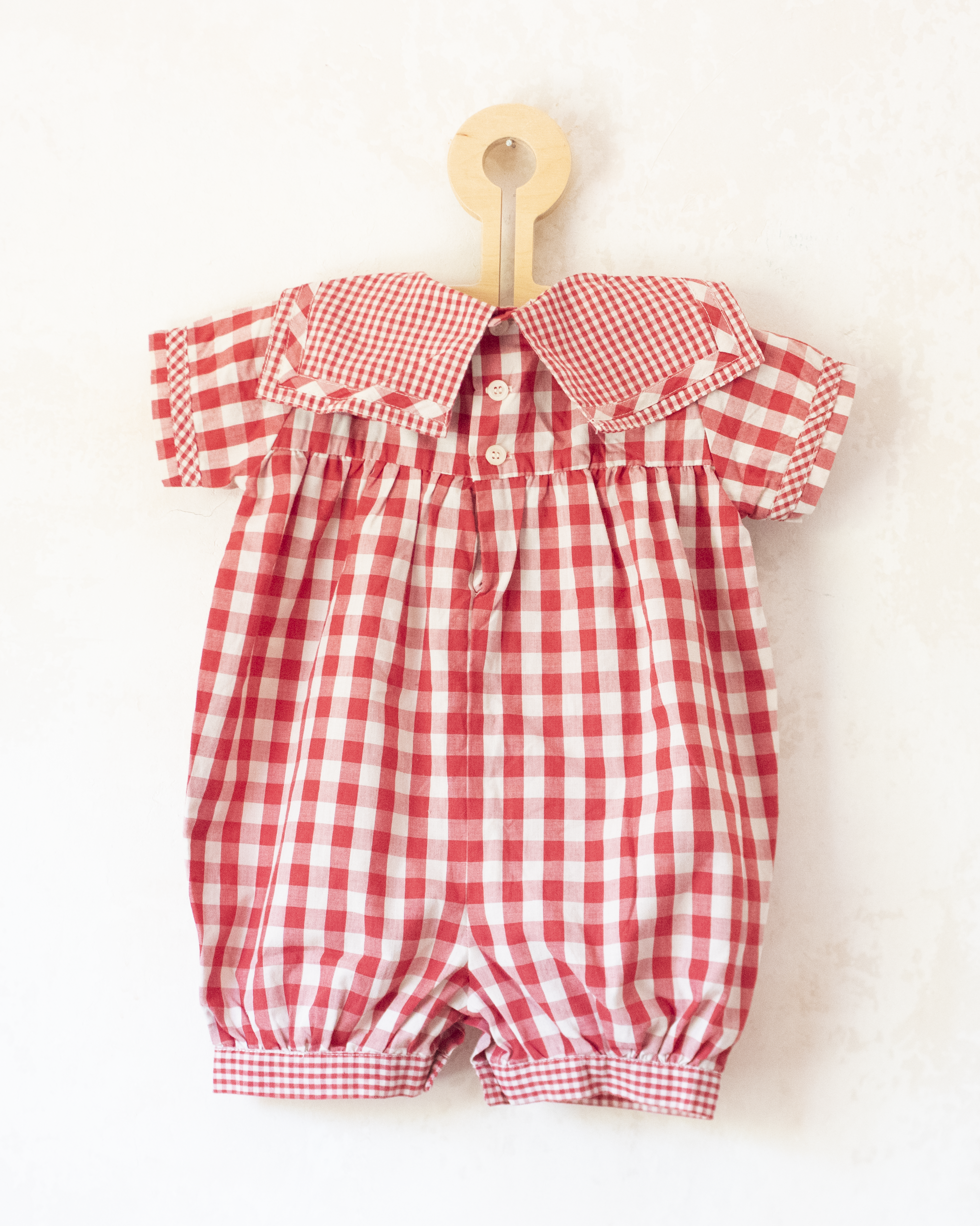 Red plaid romper with bow | 9-12 months