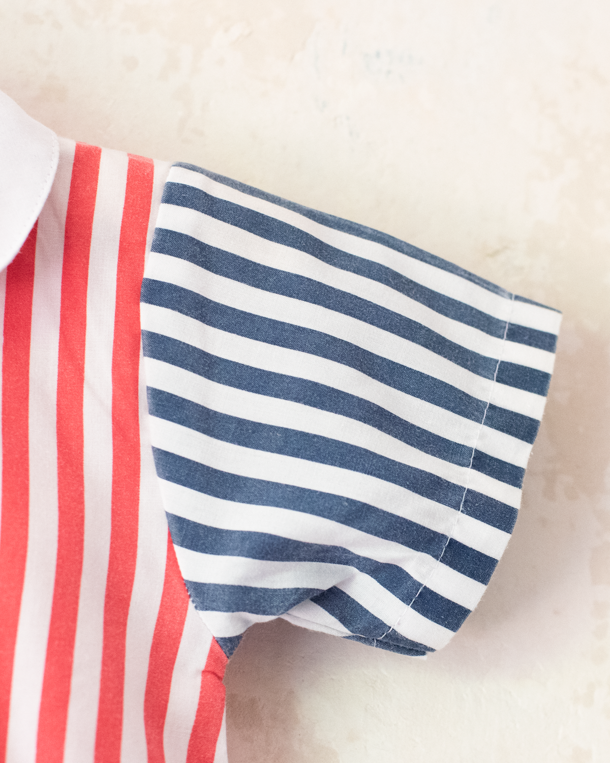 Overalls with stripes and embroidered anchors on the collar | 3-6 months