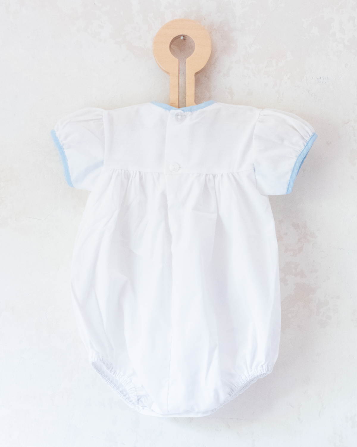 White overalls with train embroidery, birds and sun | 3-6 months