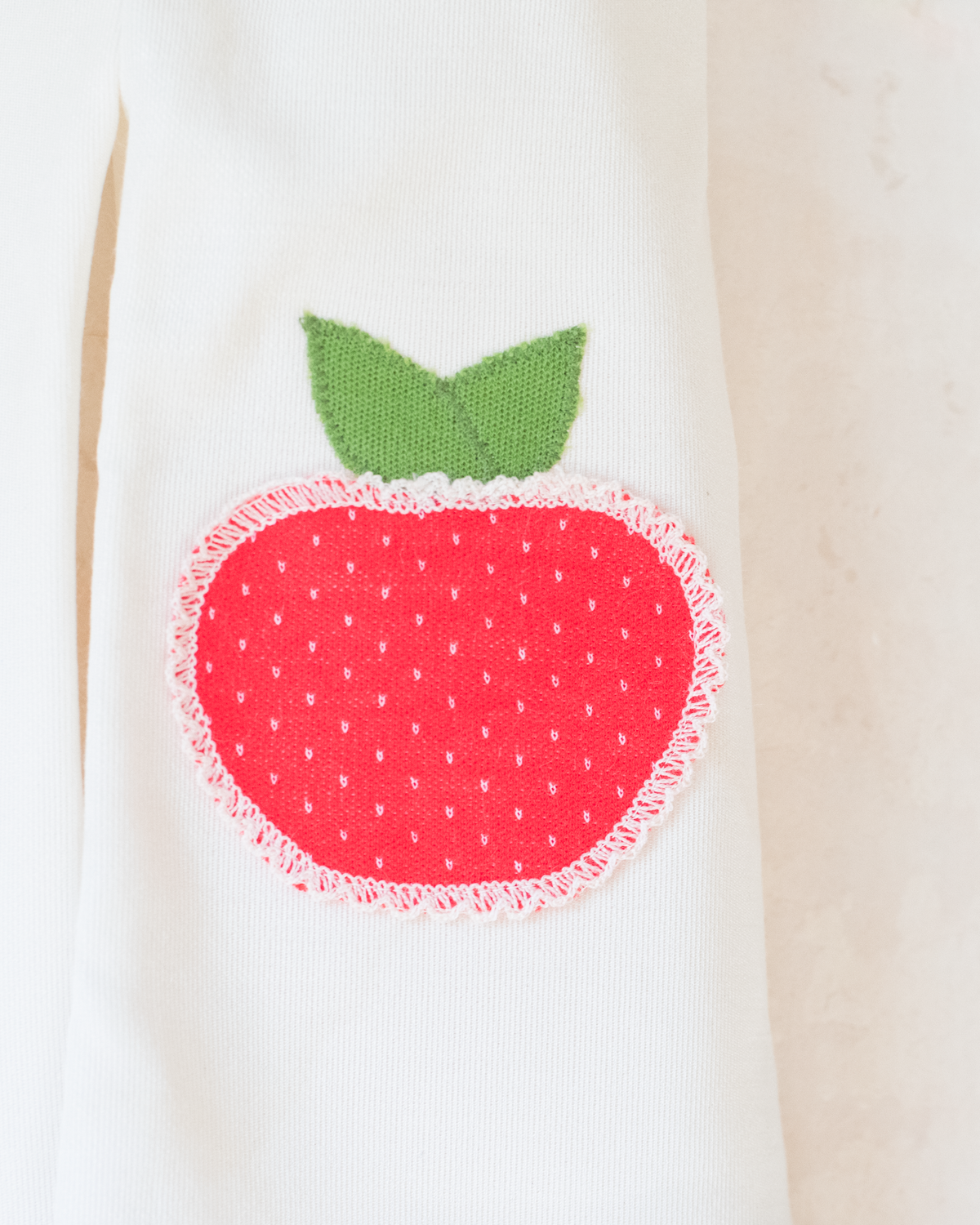 Green and white romper with embroidered apple | French deadstock | 6-9 months