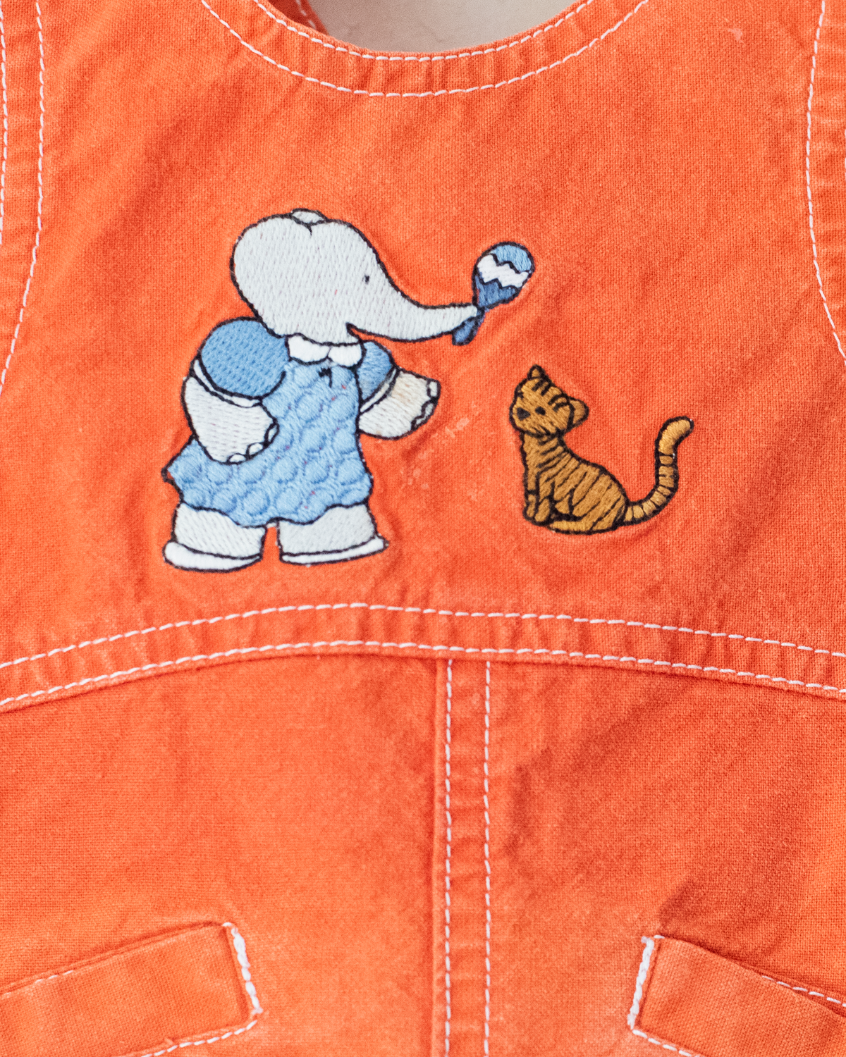 Orange sarafan with embroidery of the king and cat | 9-12 months