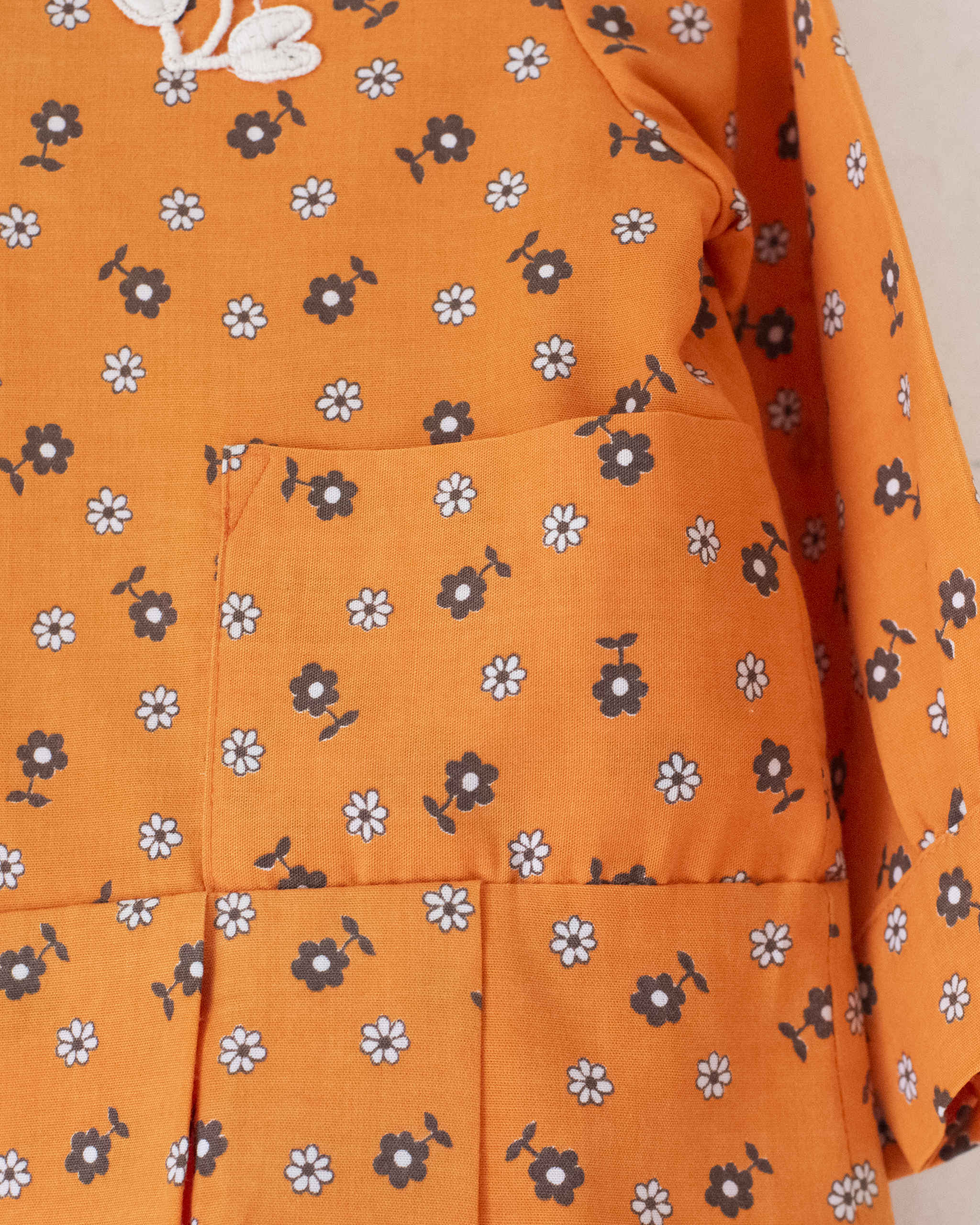 חולצה פרחונית כתומה מהסבנטיז | 18-24 חודשים