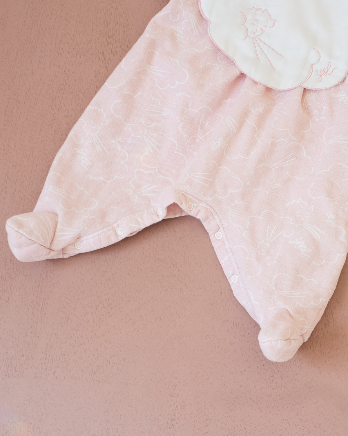 Pink pajamas from Yves Saint Laurent | 0-3 months