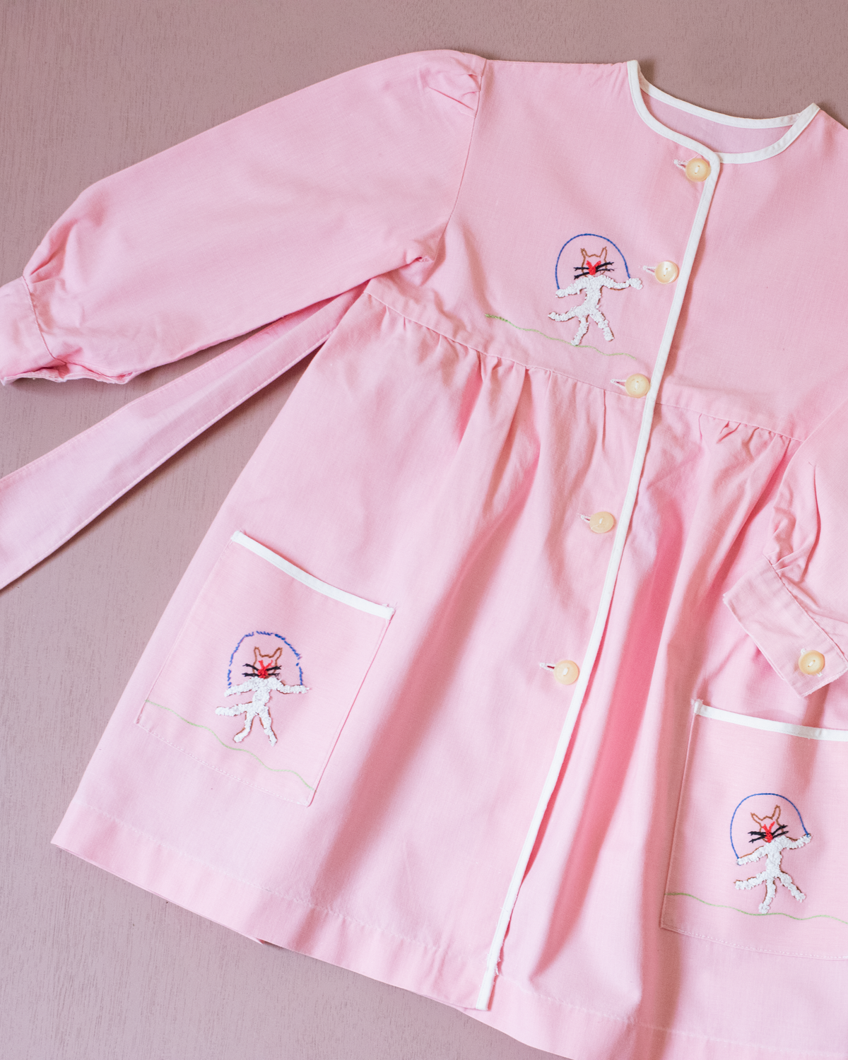 Pink tunic from the 50s with embroidered rabbits | 5-6 years