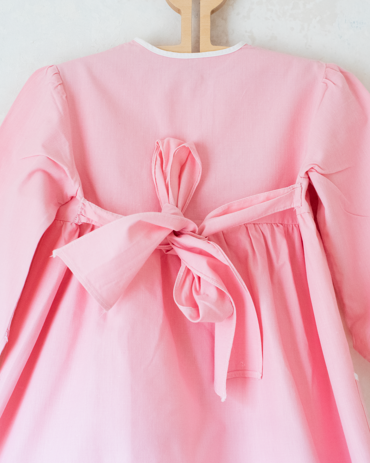 Pink tunic from the 50s with embroidered rabbits | 5-6 years