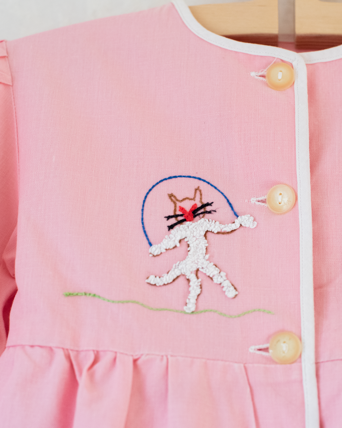 Pink tunic from the 50s with embroidered rabbits | 5-6 years