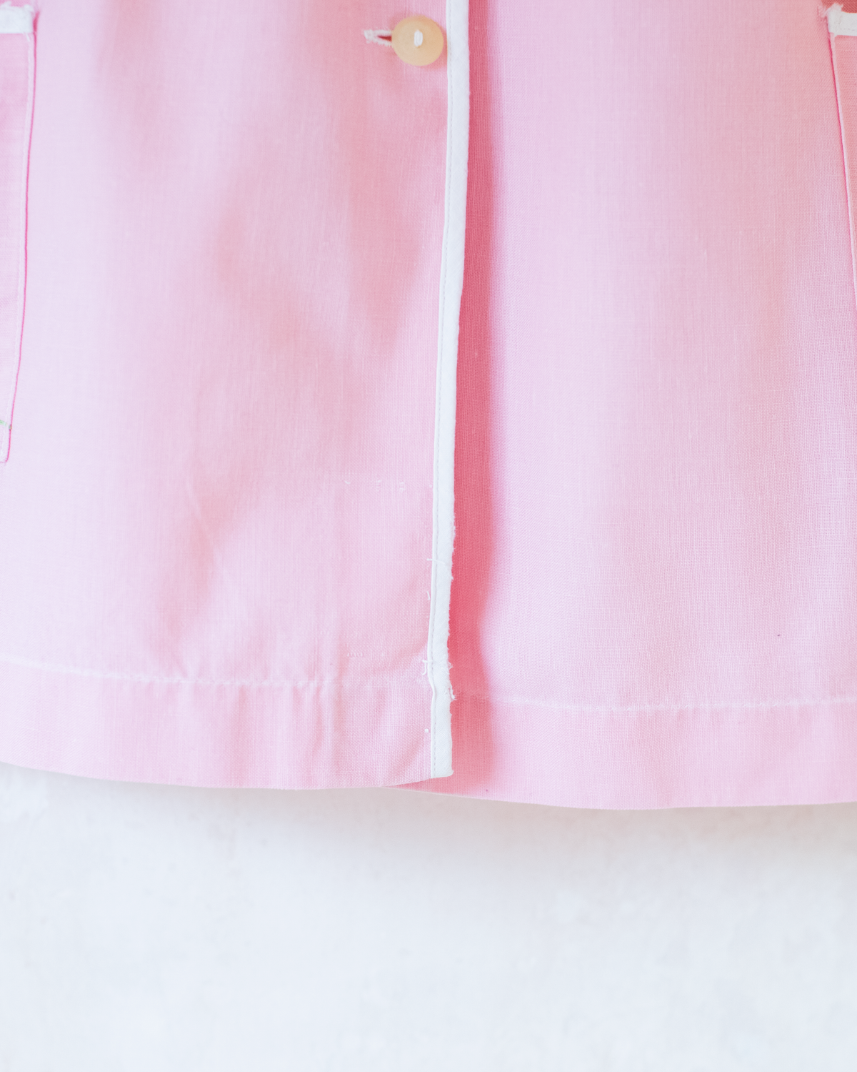Pink tunic from the 50s with embroidered rabbits | 5-6 years