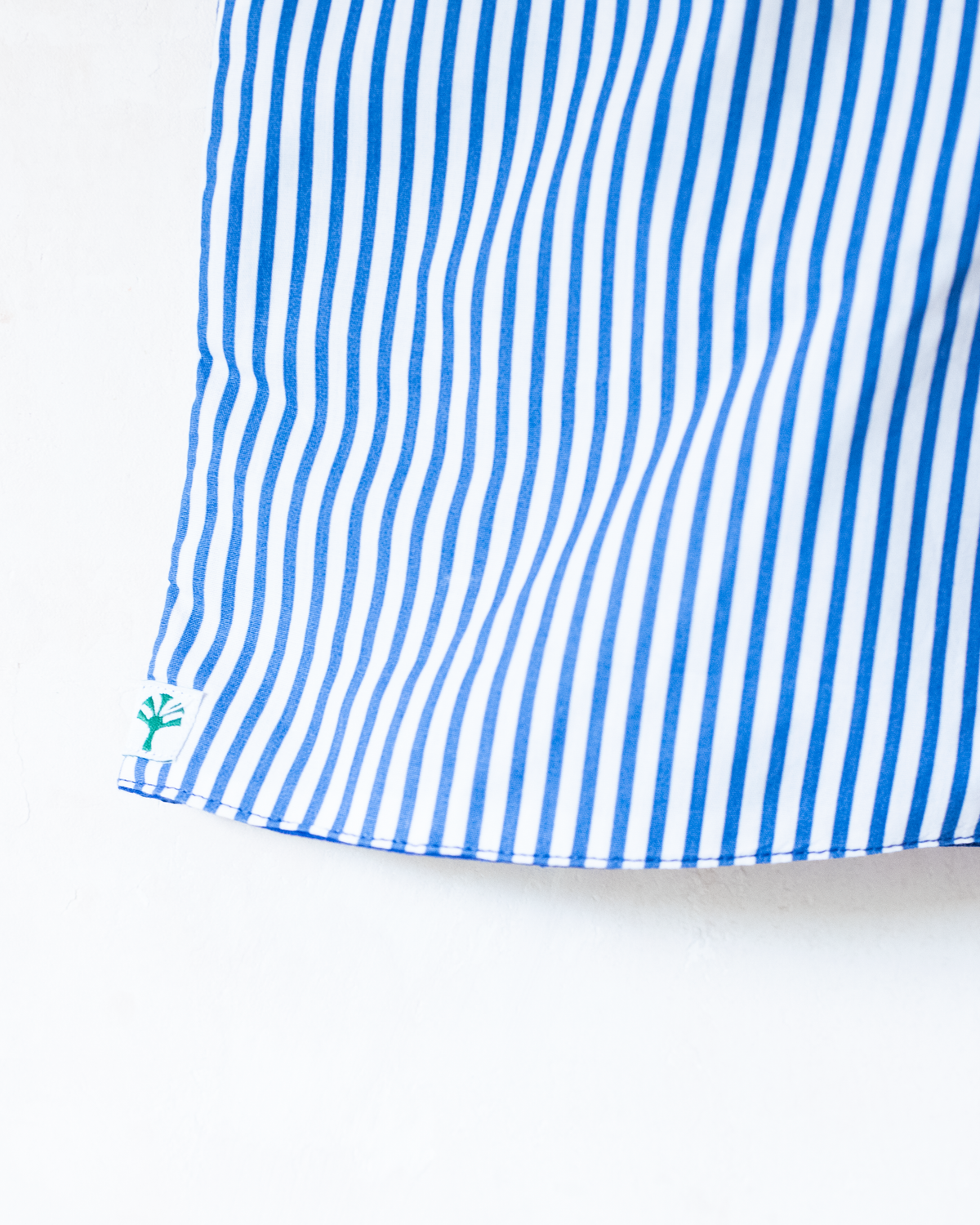 Overalls with blue stripes and an embroidered sailboat | 18-24 months