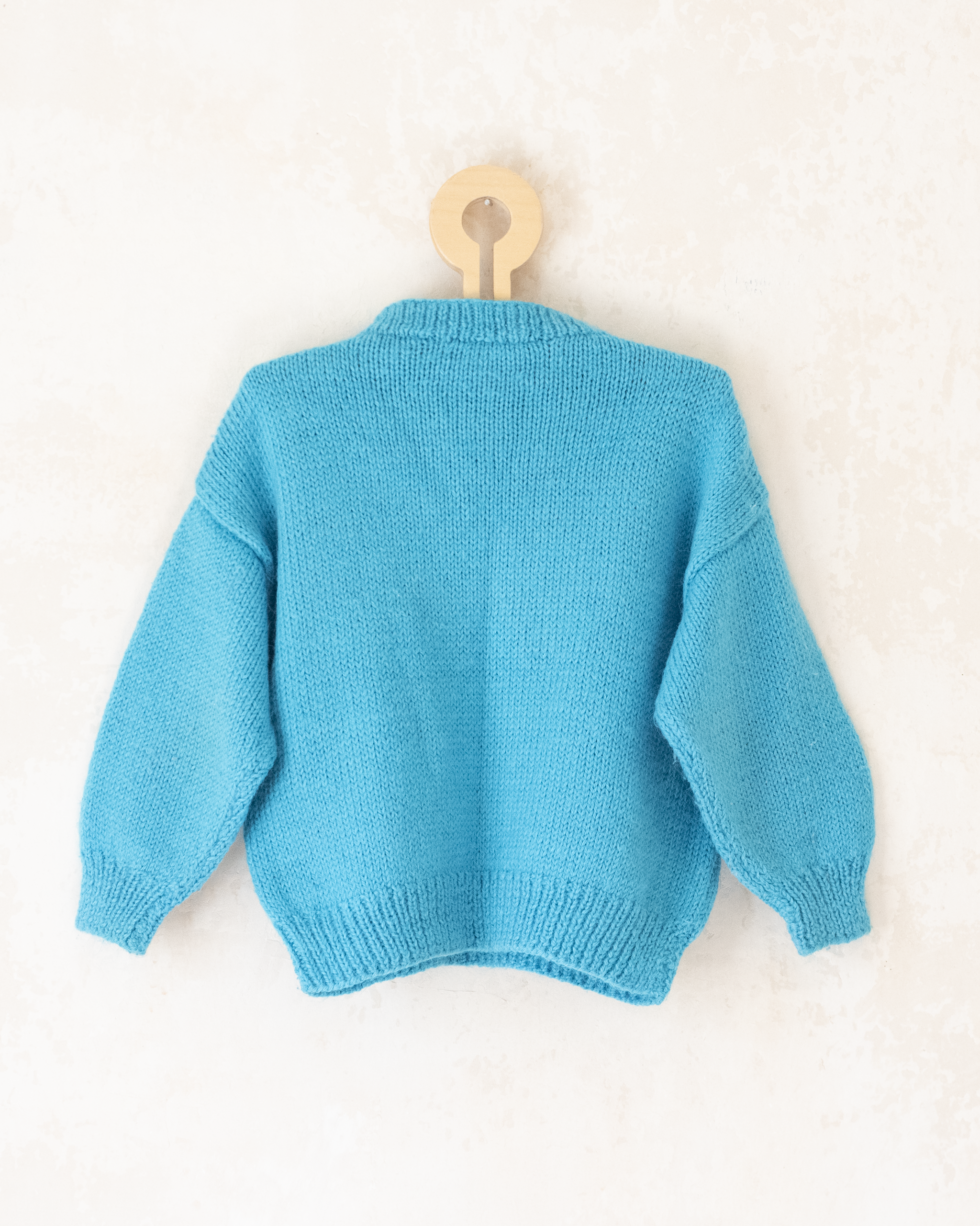 סריג טורקיז עם מעוינים לבנים | 2-3 שנים