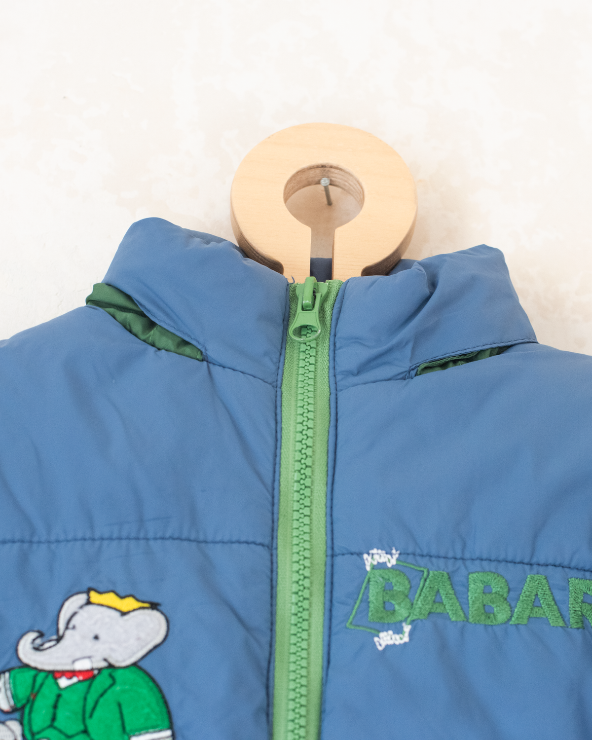 Blue fleece jacket with the king in the bar | 18-24 months