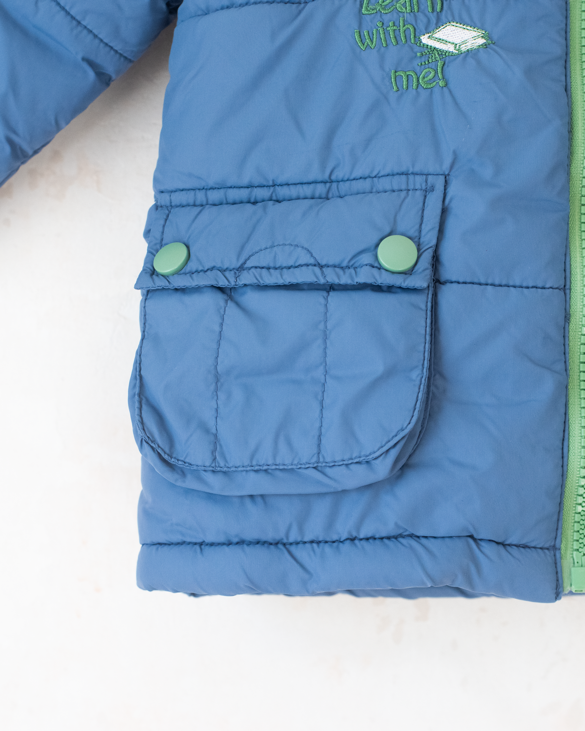 Blue fleece jacket with the king in the bar | 18-24 months