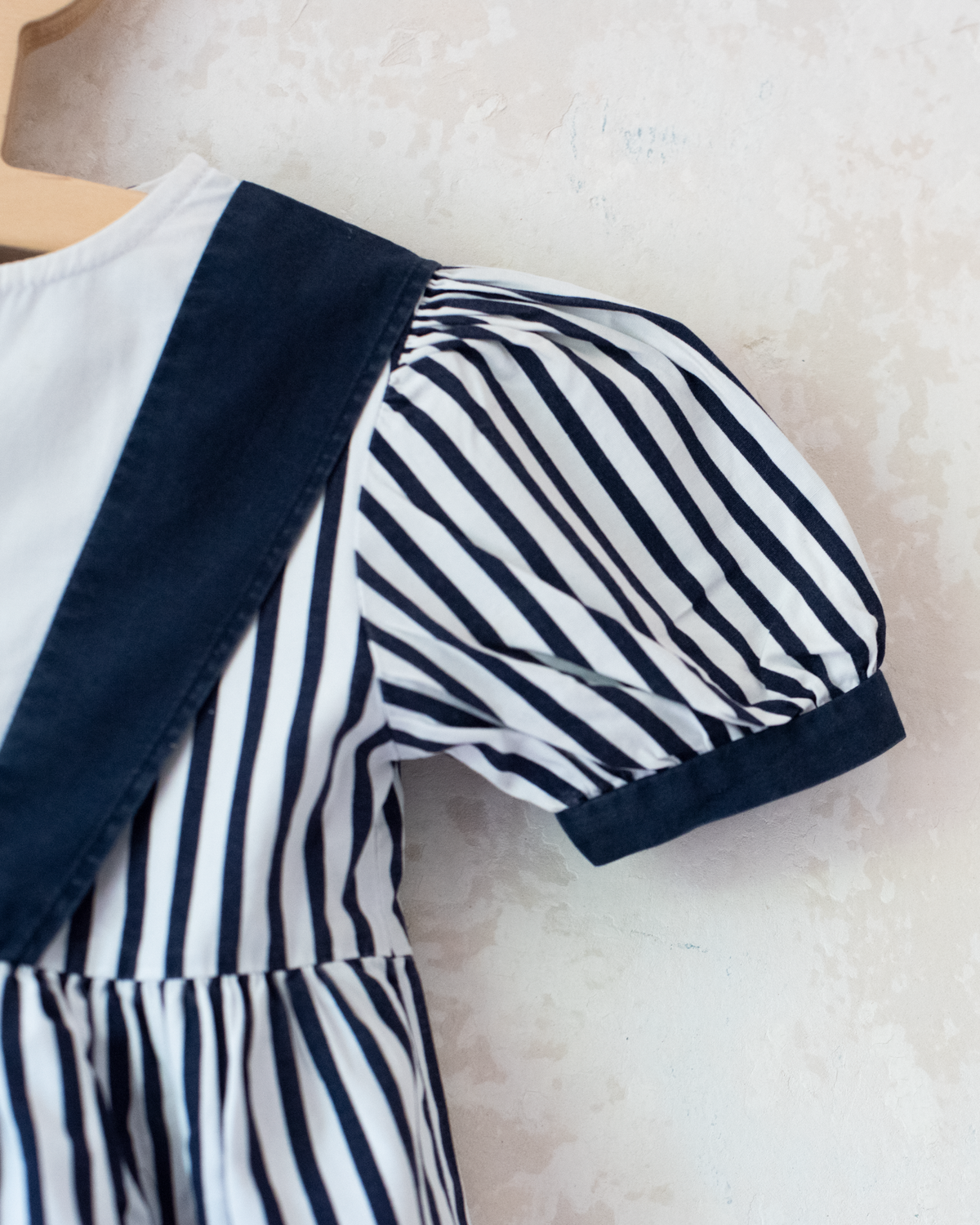 Striped dress, embroidered dolphin and bow tie | 9-12 months