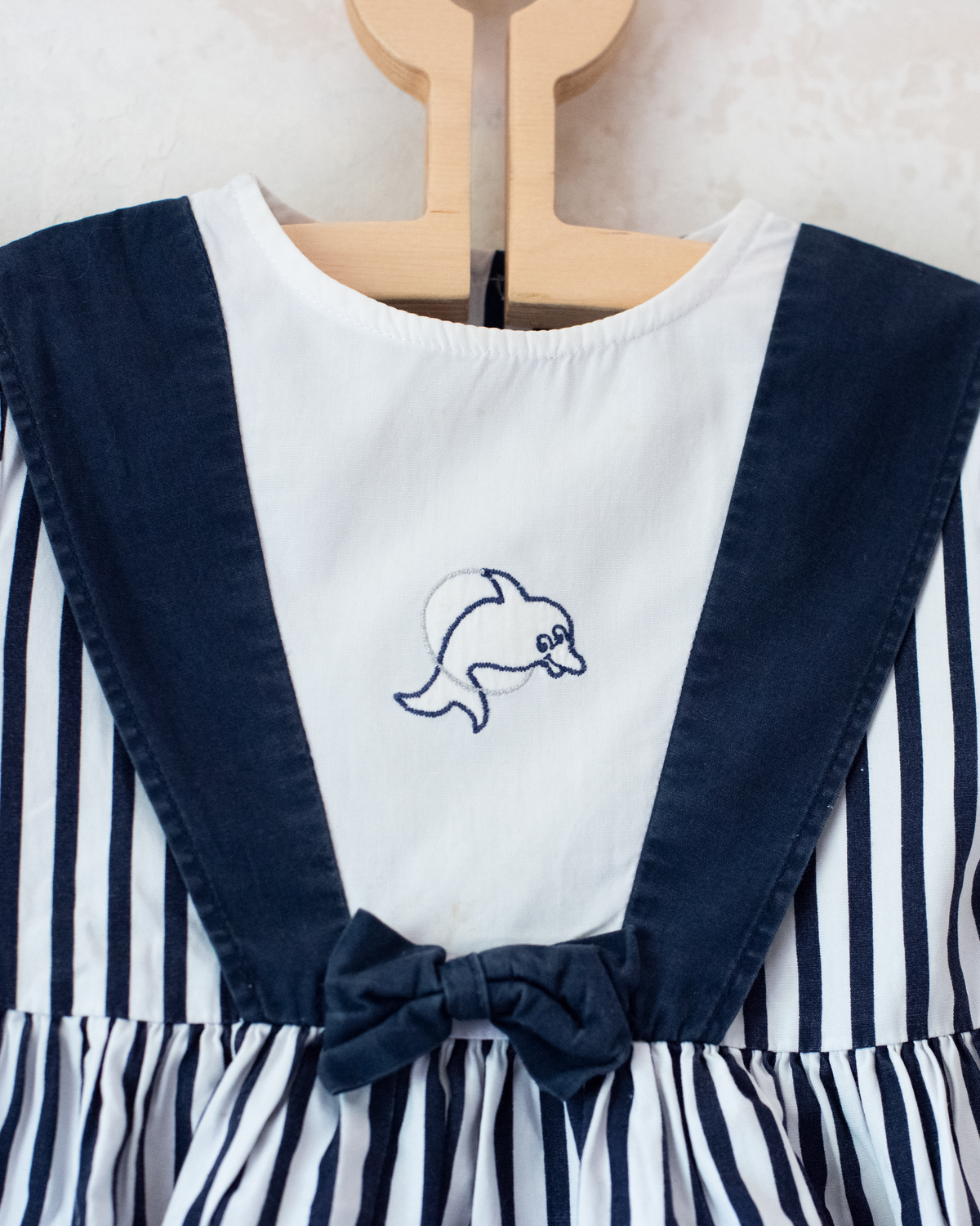 Striped dress, embroidered dolphin and bow tie | 9-12 months