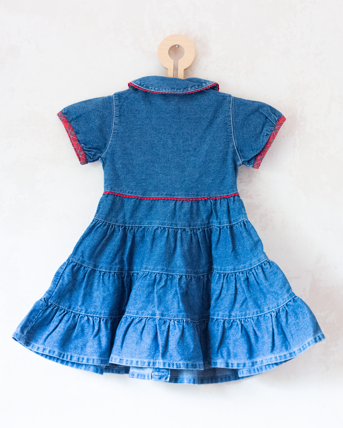 Denim dress with embroidery of the King of Bar and Zafir playing | 18-24 months