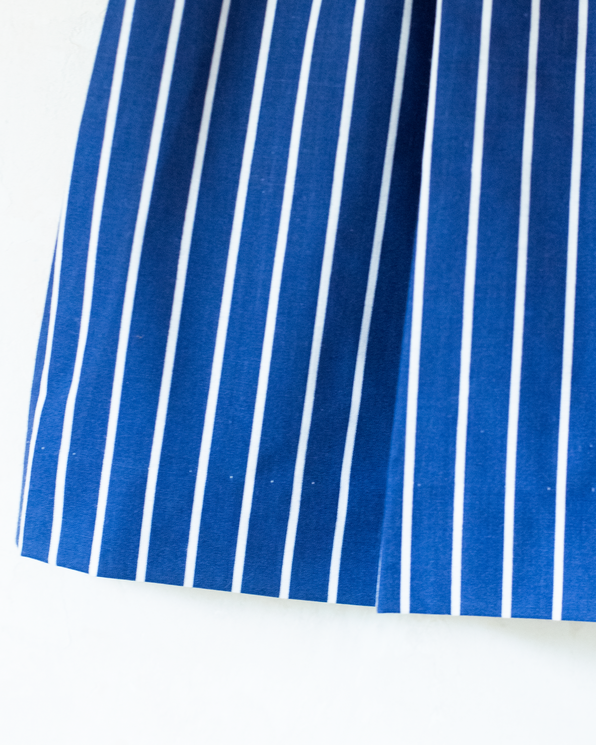 Blue dress with stripes, dots and a large bow tie | Spanish dead stock | 12-18 months