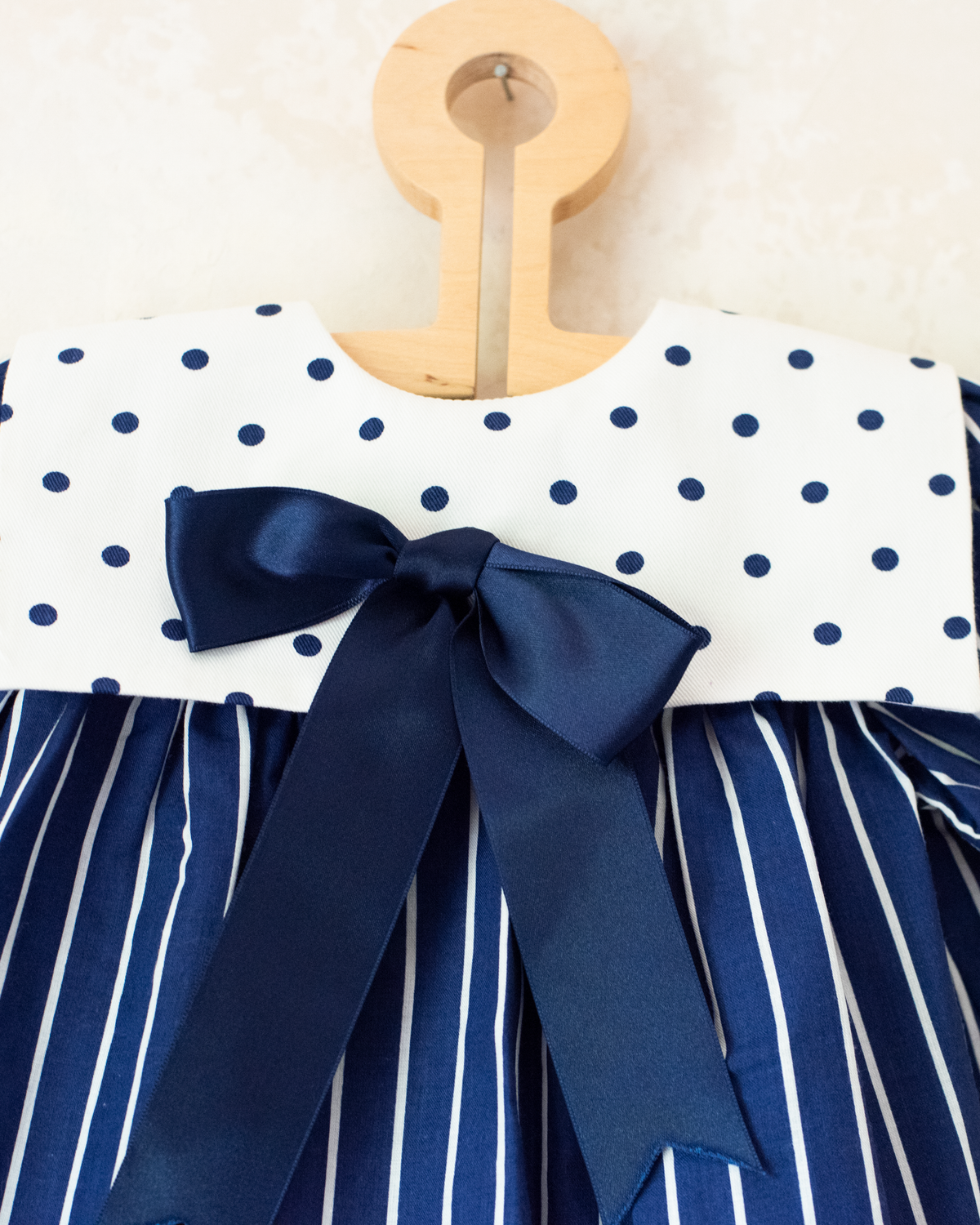 Blue dress with stripes, dots and a large bow tie | Spanish dead stock | 12-18 months