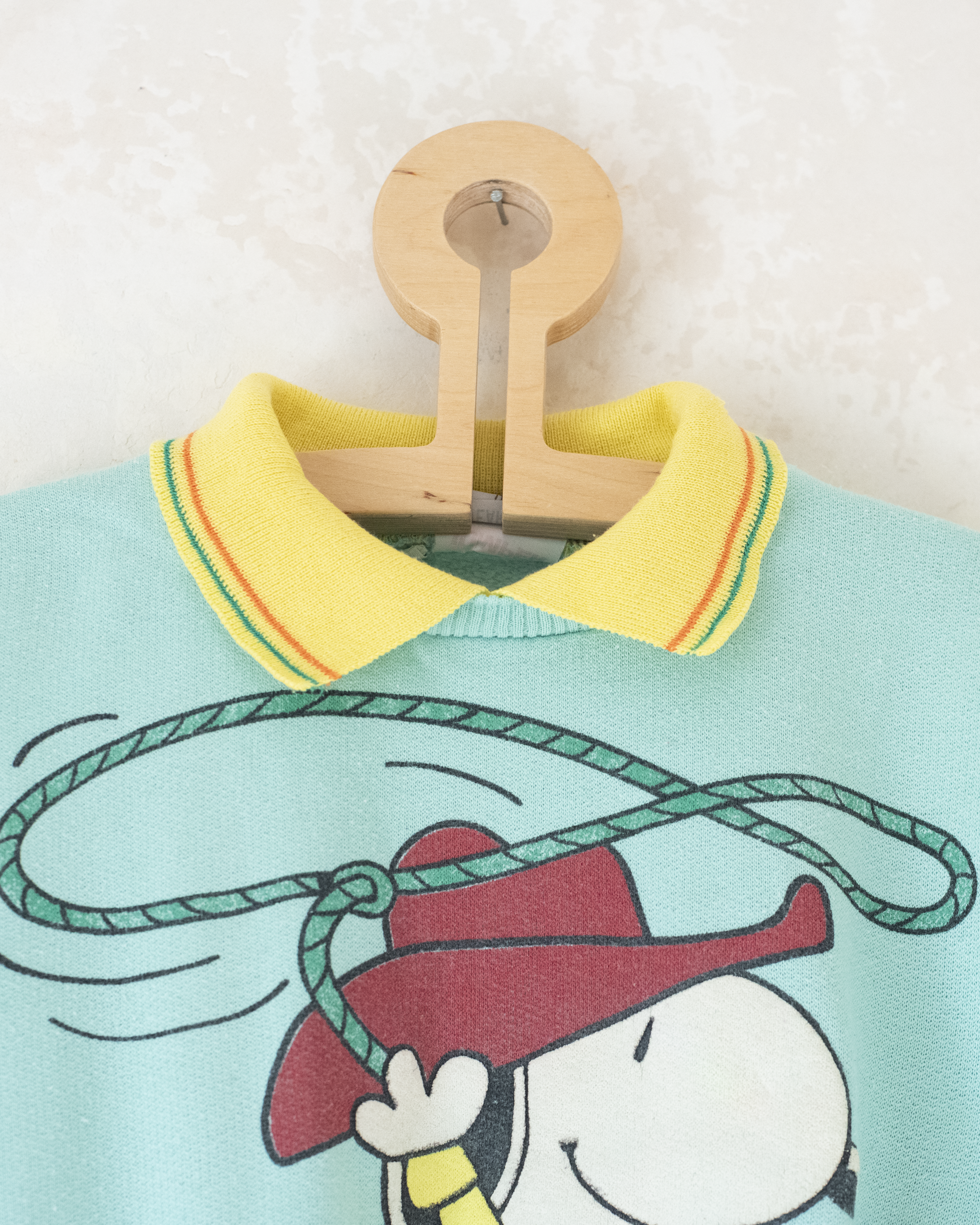 סווטשירט טורקיז בהיר עם סנופי הקאובוי | 5-6 שנים
