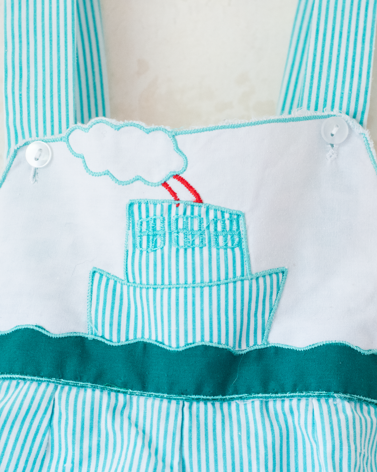 Striped overalls and embroidered ship | 9-12 months